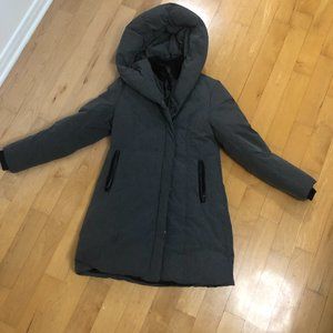 MONTE VEGAN LONG QUILTED CIRE COAT WITH INNER ZIP-UP BIB AND PILLOW HOOD BY SAKI